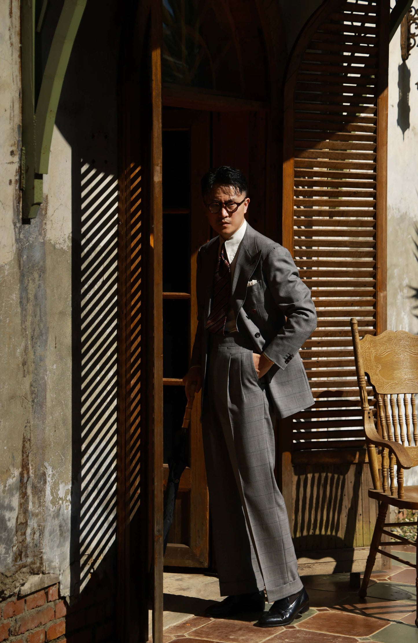 High-Waisted Suit Trousers with Parisian Side Adjusters — Grey Prince of Wales Check